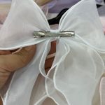 پشت کار گیره انبری پاپیون حریر دنباله دار